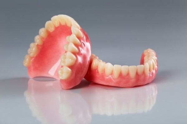 THE STABILIZATION OF COMPLETE DENTURES